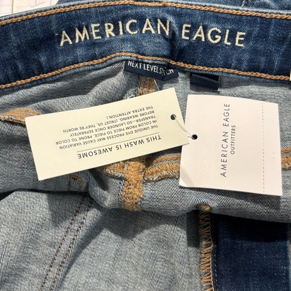 AMERICAN EAGLE Sz 16S Super High Rise Flare Distressed Hem Mid-Wash Jeans NEW - Picture 10 of 13